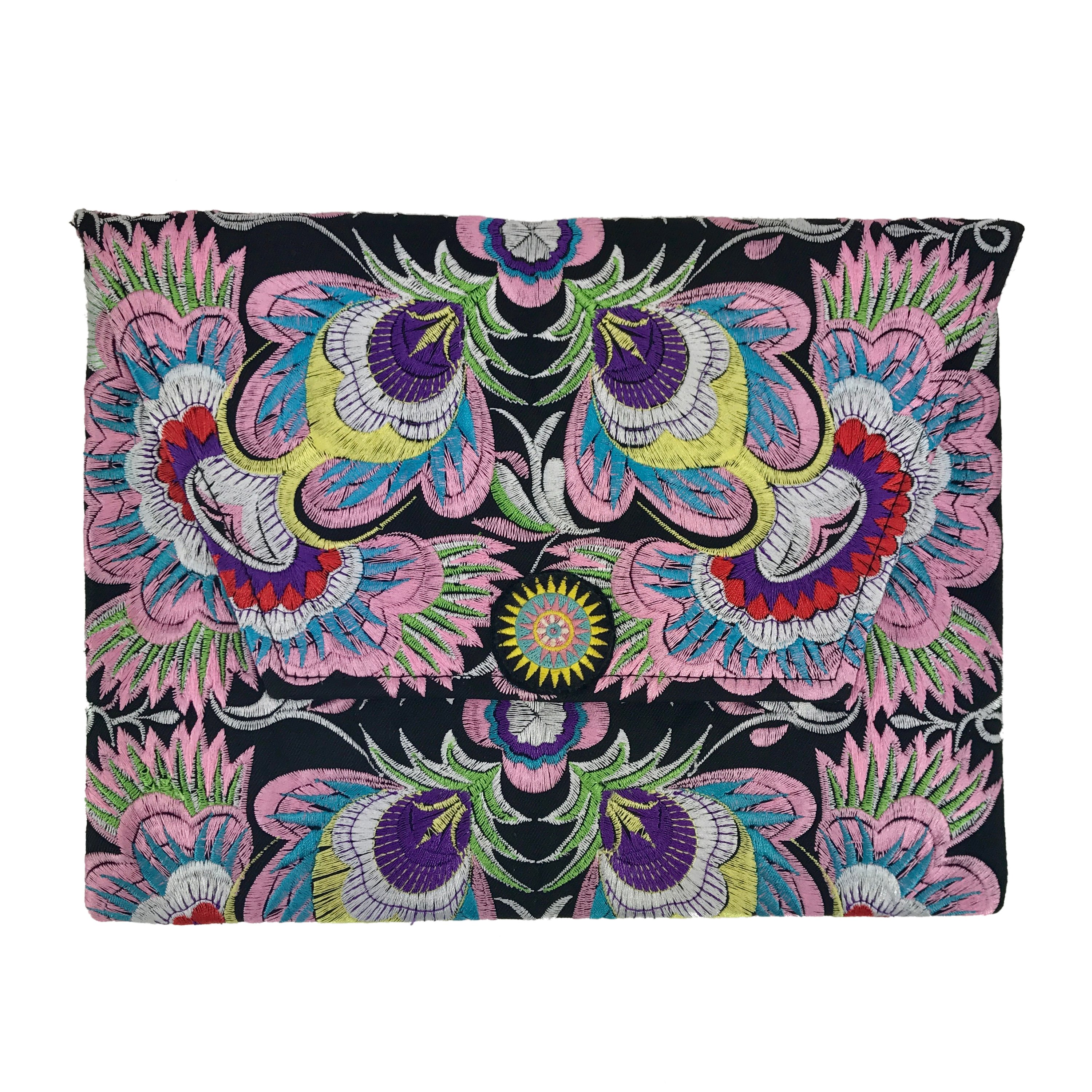 Embroidered Flower Clutch showcasing vibrant floral patterns, handcrafted by Hmong artisans in Thailand, featuring a zippered pocket and magnetic closure.