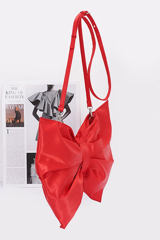 Oversize Satin Bow Convertible Clutch Swing Bag featuring a large satin bow, removable shoulder strap, and elegant design in a stylish color.