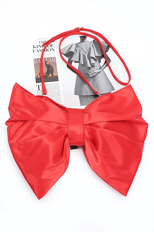 Oversize Satin Bow Convertible Clutch Swing Bag featuring a large satin bow, removable shoulder strap, and elegant design in a stylish color.