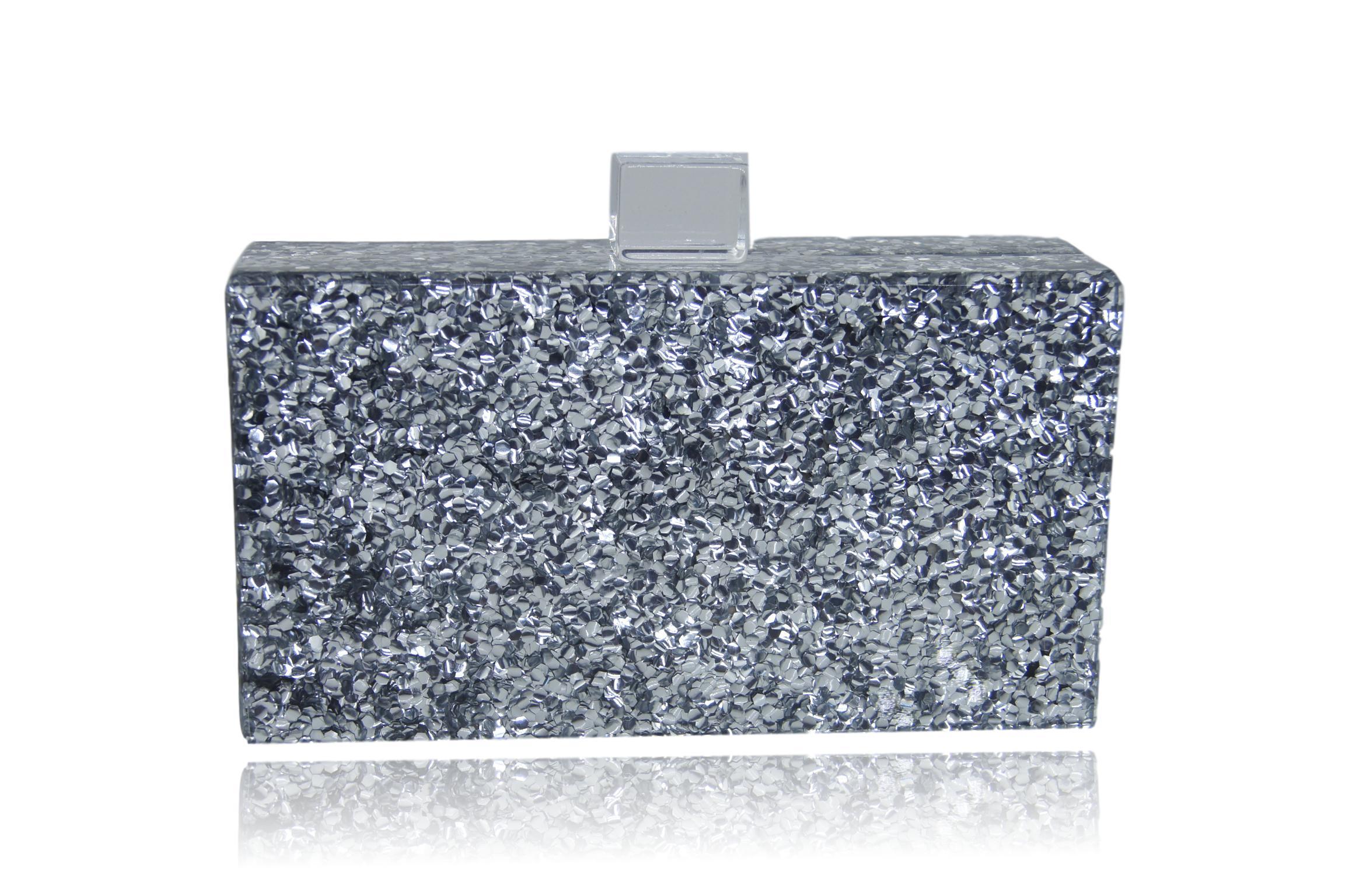 Silver glitter-covered clutch bag.