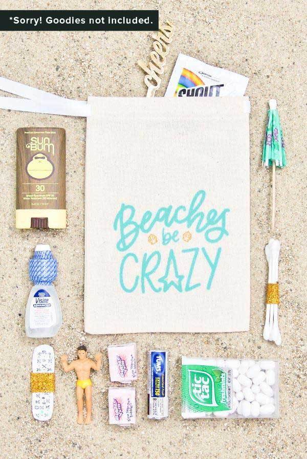 Beaches Be Crazy Hangover Kit Bags featuring glittery gold seashells and minty teal lettering, perfect for beach events and gifts.