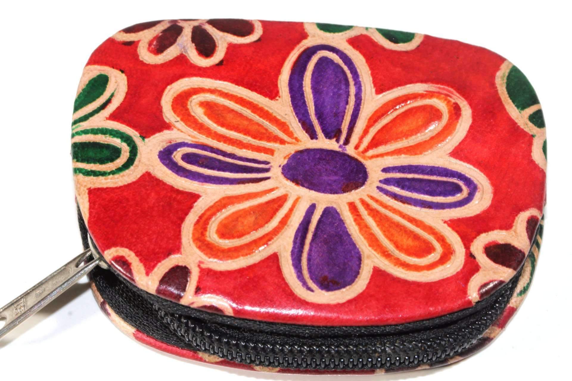 A colorful Groovy Flower Coin Purse made of genuine leather, featuring embossed floral designs and a sturdy zipper, perfect for storing loose change.