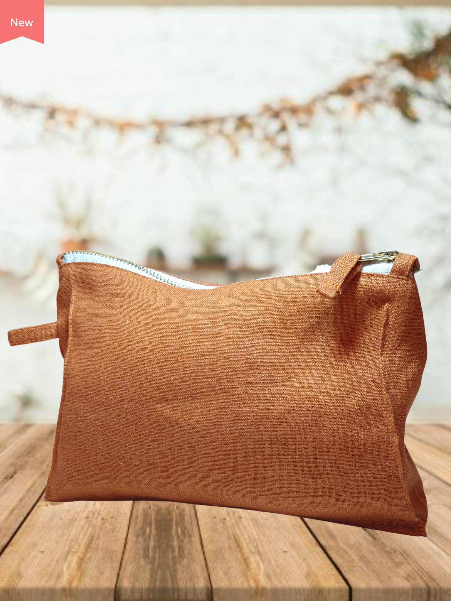 Light Chestnut linen toiletry bag with zipper, showcasing its soft texture and stylish design, perfect for travel and organization.