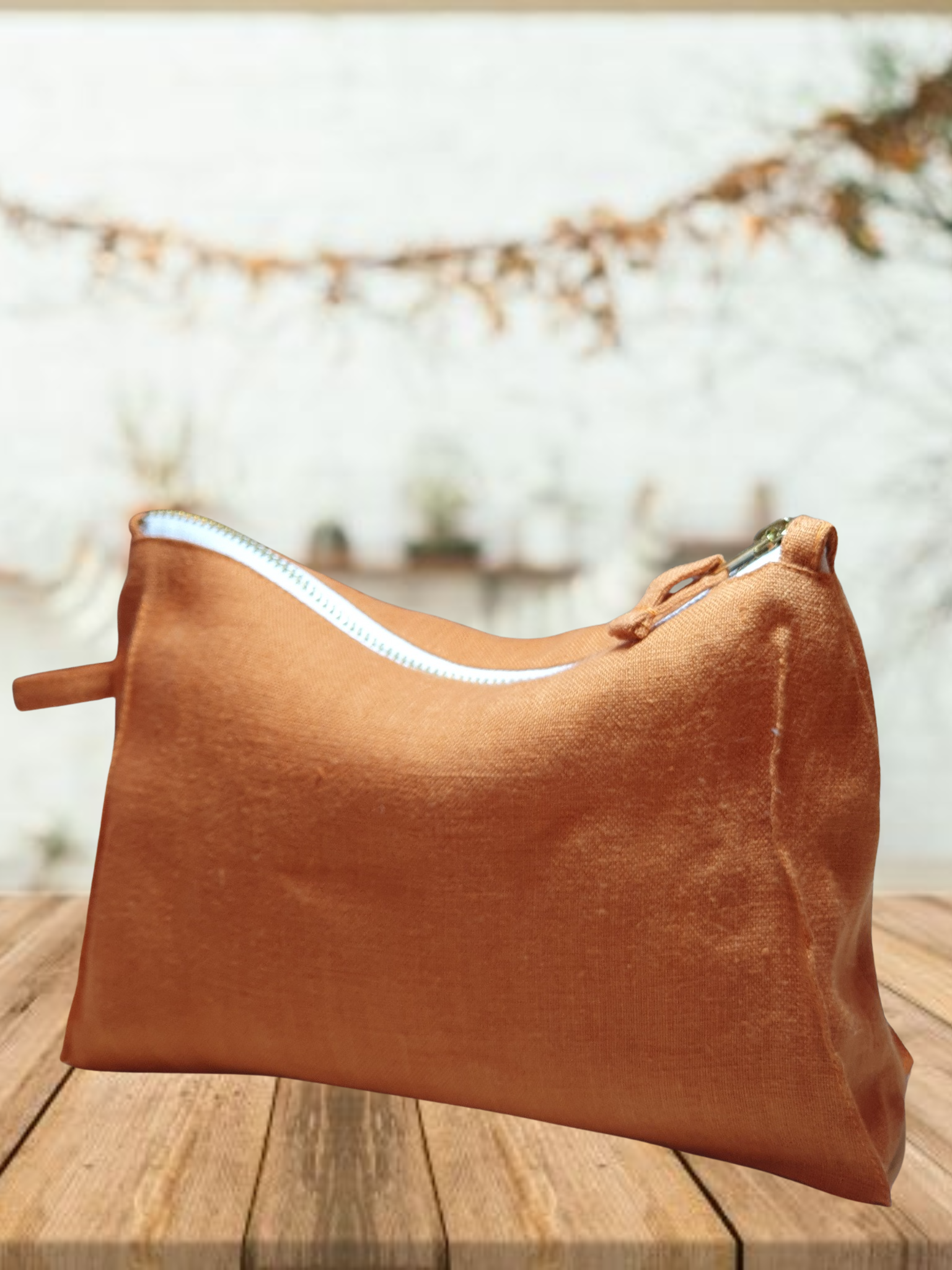 Light Chestnut linen toiletry bag with zipper, showcasing its soft texture and stylish design, perfect for travel and organization.