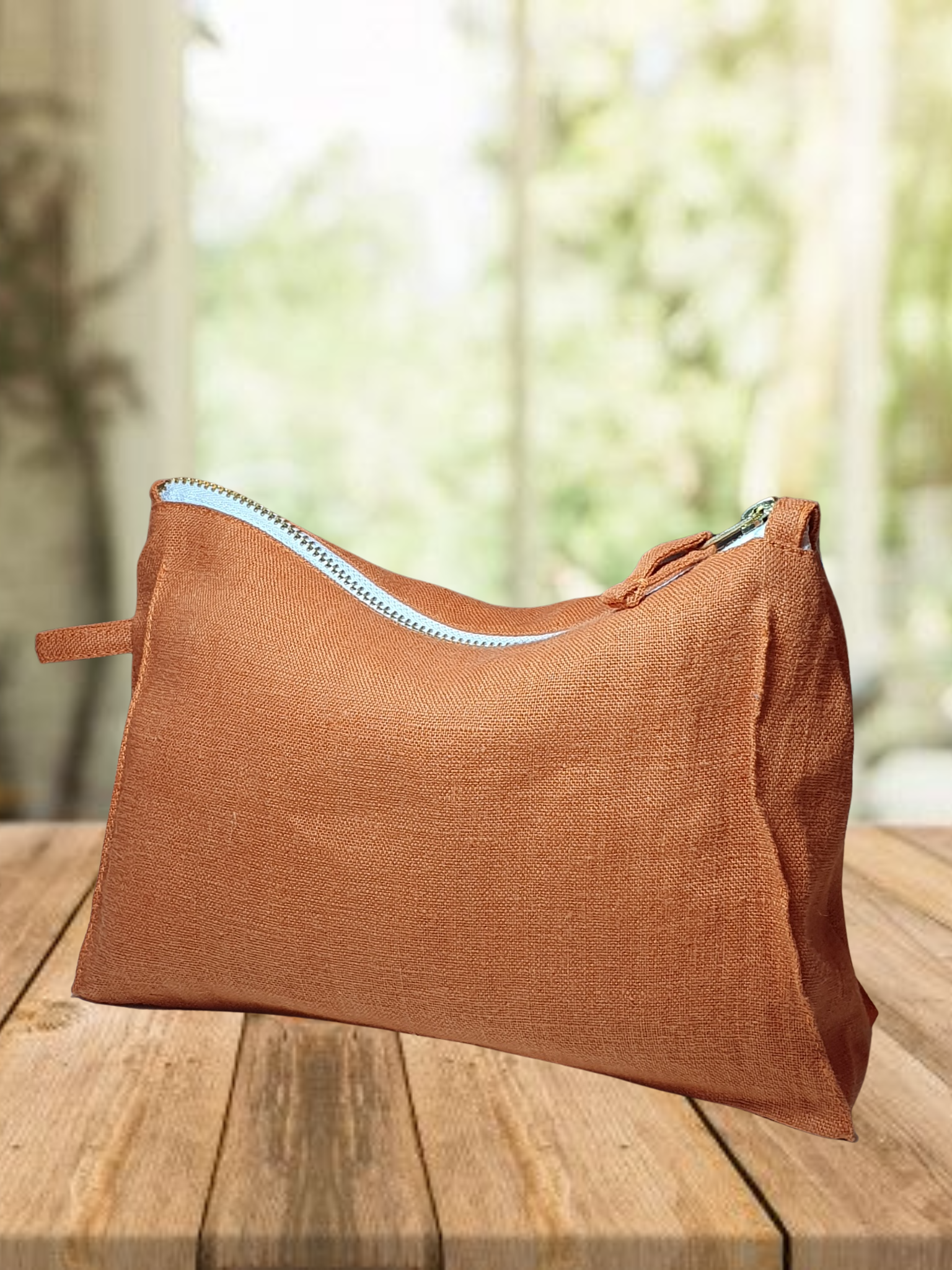 Light Chestnut linen toiletry bag with zipper, showcasing its soft texture and stylish design, perfect for travel and organization.