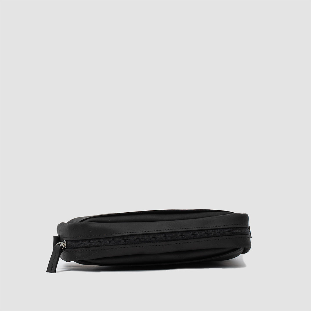 A sleek black mini messenger bag featuring multiple pockets and adjustable straps, perfect for organizing essentials.