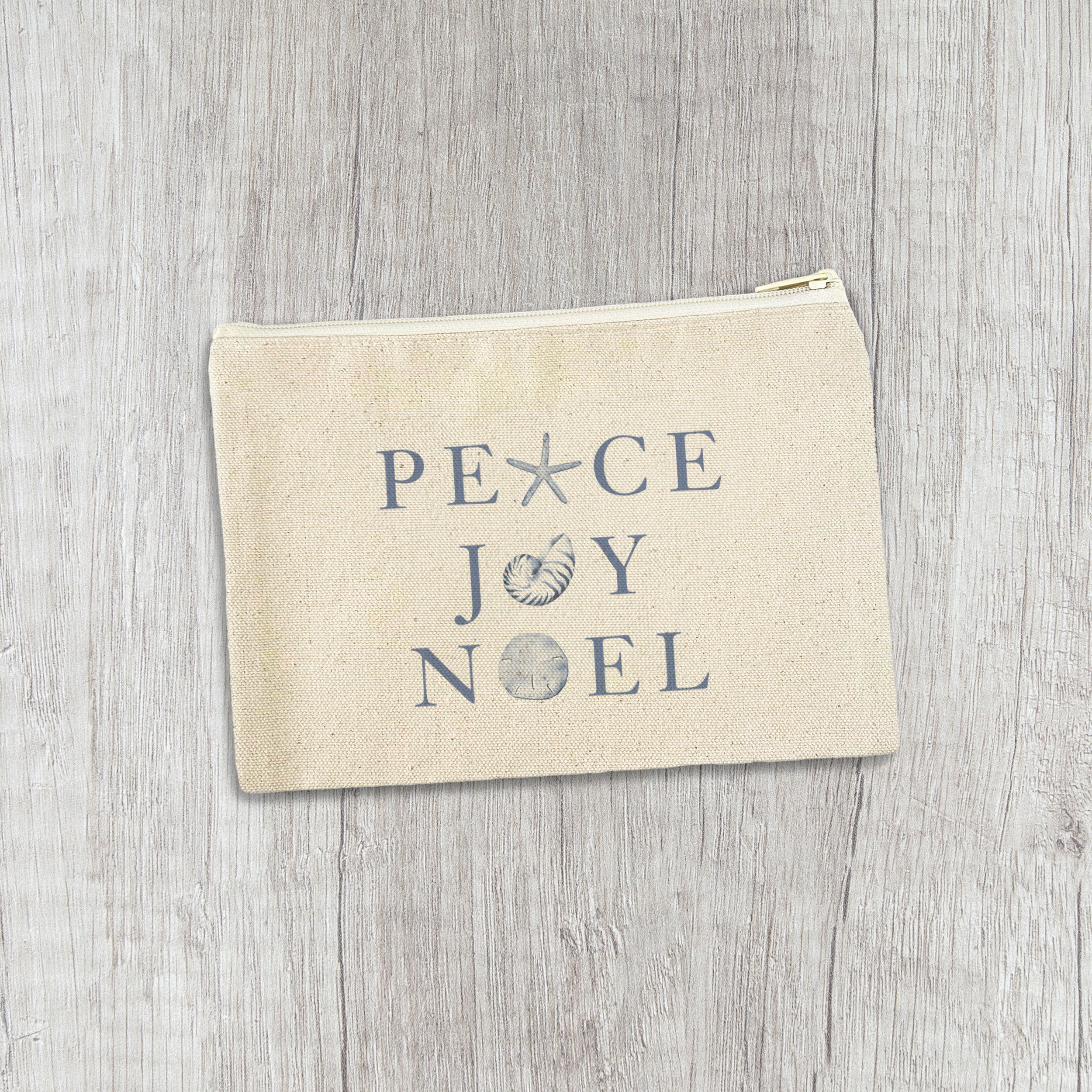 Peace Joy Noel canvas zipper pouch with natural color zipper, showcasing its cute design and durable cotton material.