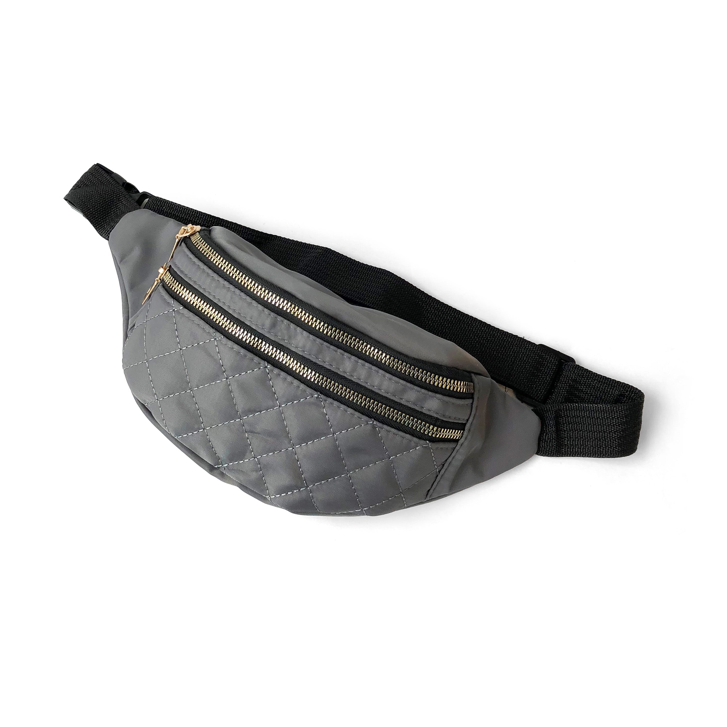 Nicci Quilted Waistbag in lightweight nylon with gold tone hardware, featuring adjustable strap and multiple zip compartments.