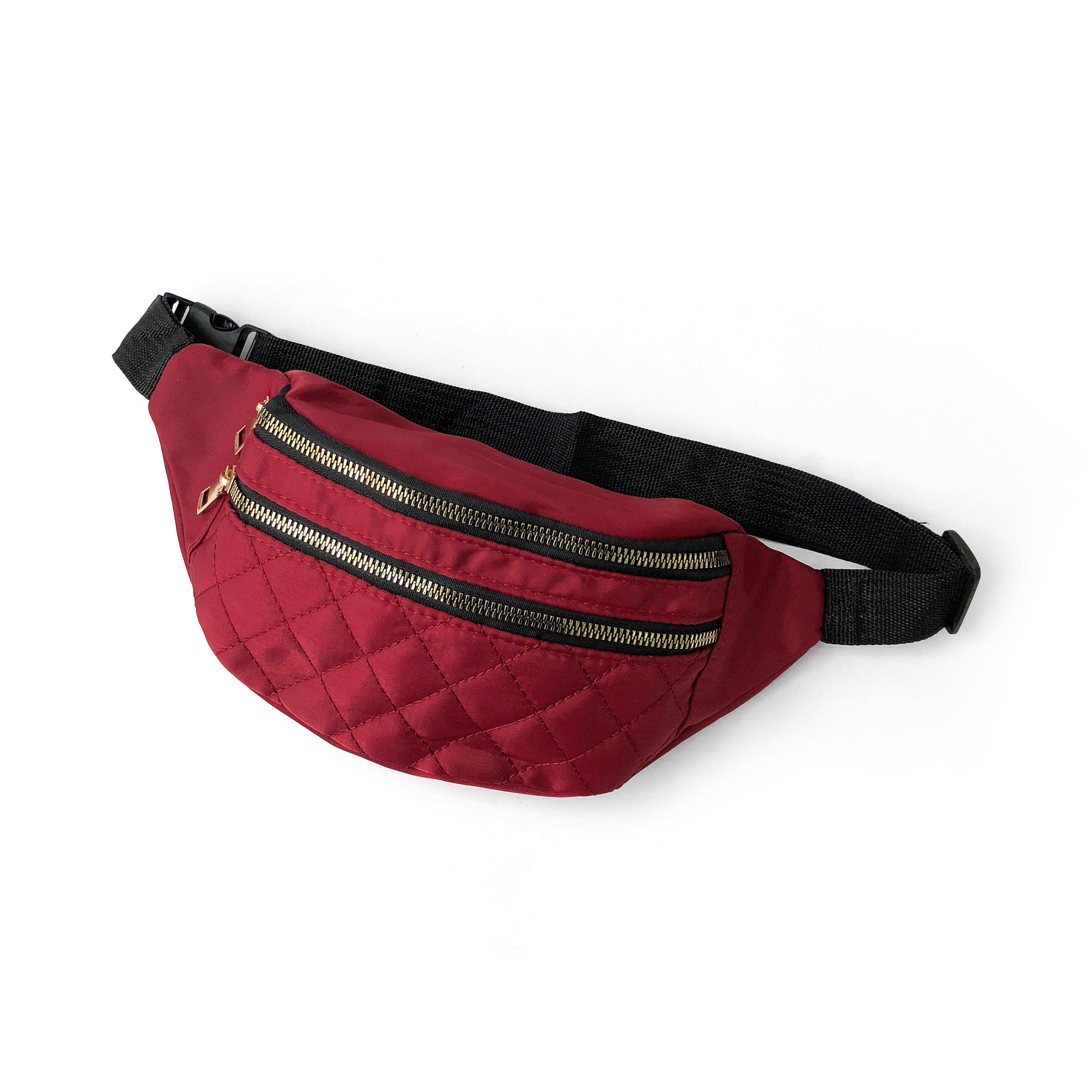 Nicci Quilted Waistbag in lightweight nylon with gold tone hardware, featuring adjustable strap and multiple zip compartments.