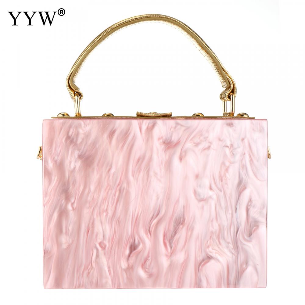 A stylish acrylic handbag for women featuring a flower design, perfect for evening parties and special occasions.