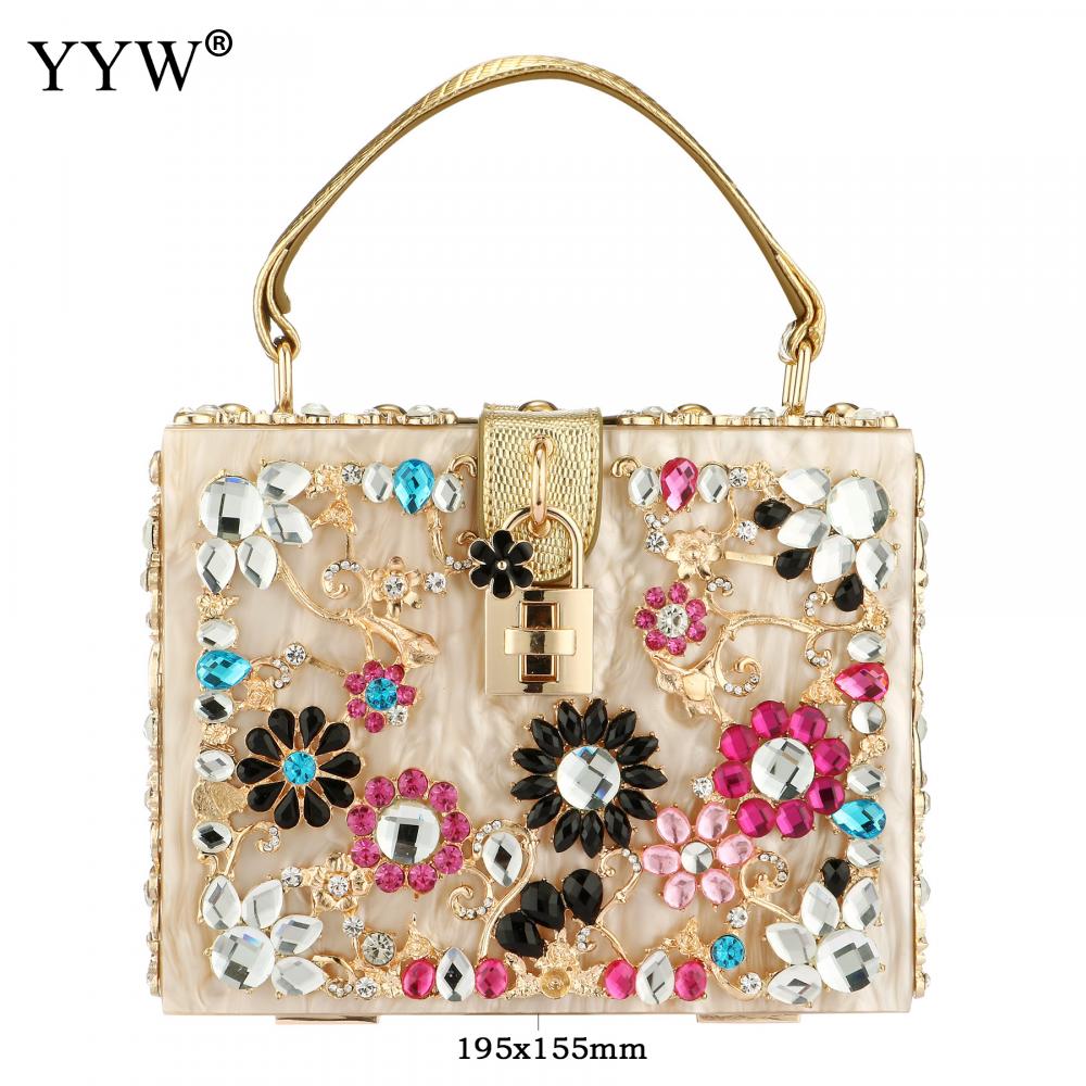 A stylish acrylic handbag for women featuring a flower design, perfect for evening parties and special occasions.