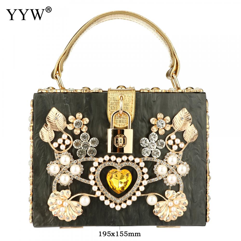 A stylish acrylic handbag for women featuring a flower design, perfect for evening parties and special occasions.