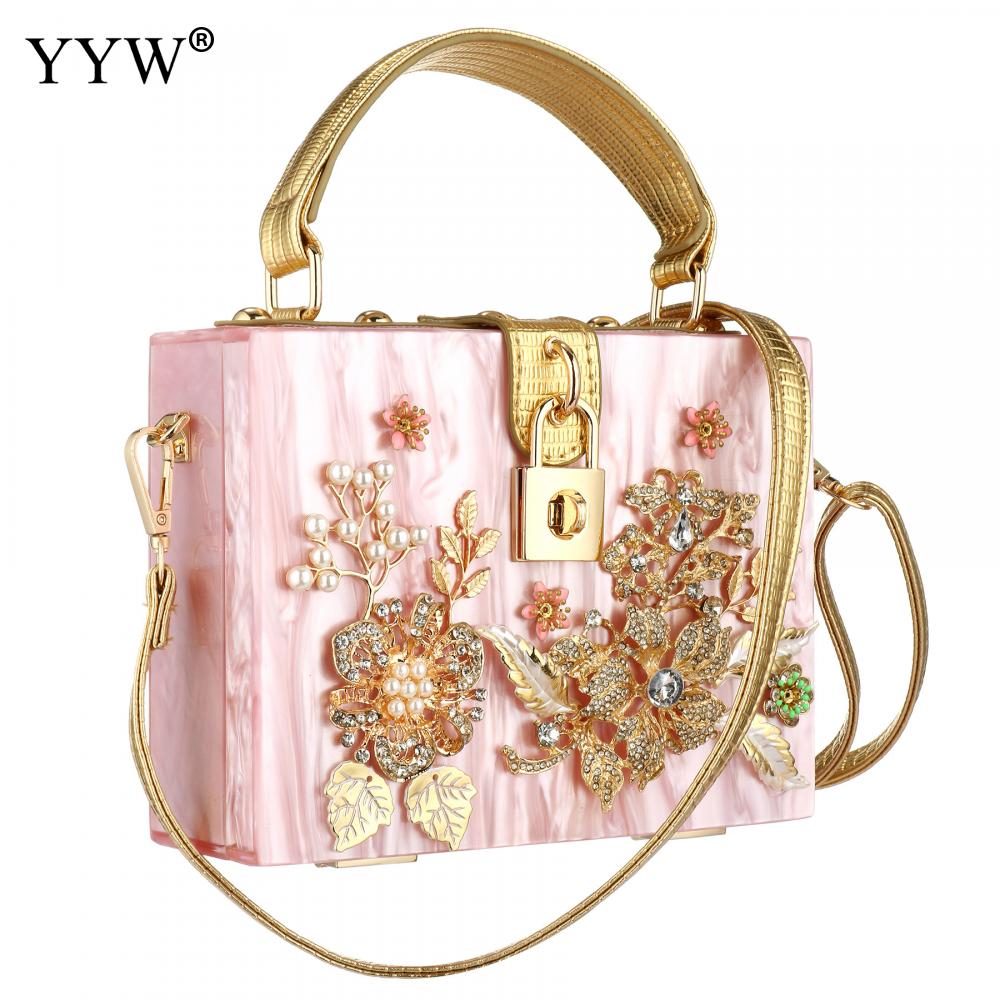 A stylish acrylic handbag for women featuring a flower design, perfect for evening parties and special occasions.