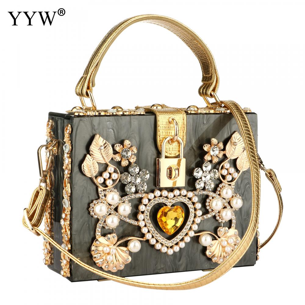 A stylish acrylic handbag for women featuring a flower design, perfect for evening parties and special occasions.