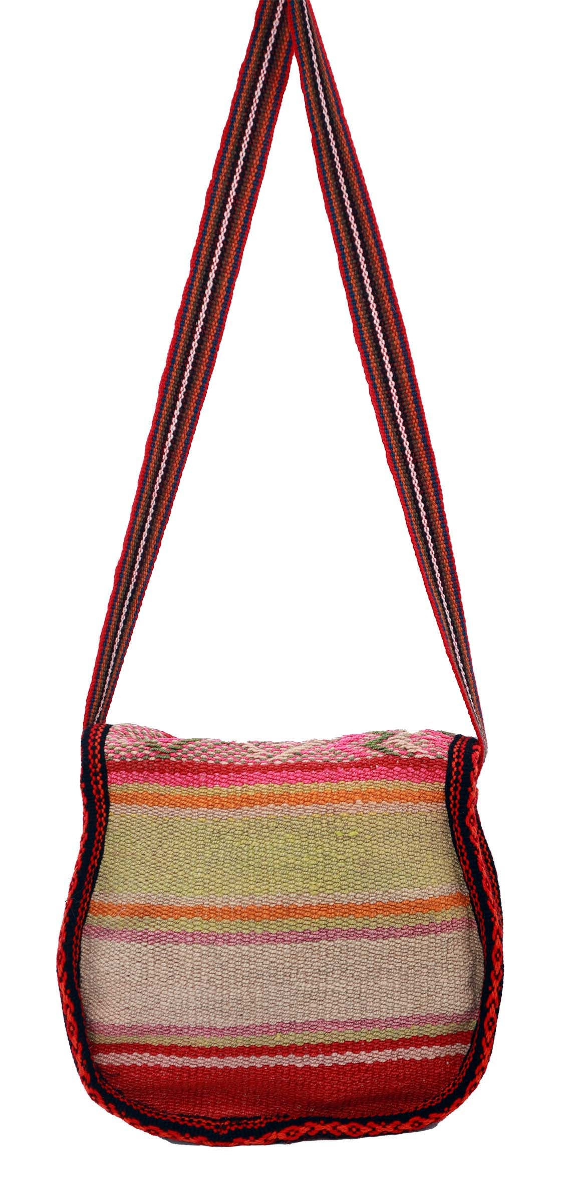 Artisan Woven Button Crossbody Bag featuring vibrant colors and intricate designs, handmade by Quechua artisans with natural dyes.