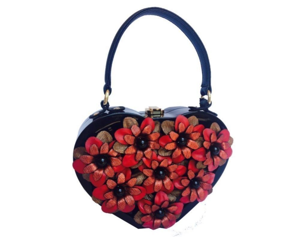 Babylon Gardens handbag featuring a romantic flower bouquet design, crafted from hand-carved acacia wood with a high gloss black lacquer finish.