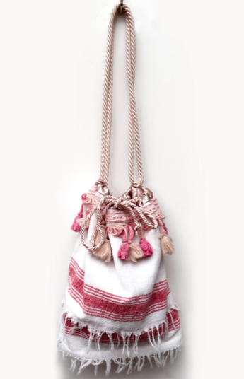 Beachy peshtemal featuring bronze sateen lining, double rose-gold cord, and decorative fringes, measuring 30H x 38W cm.