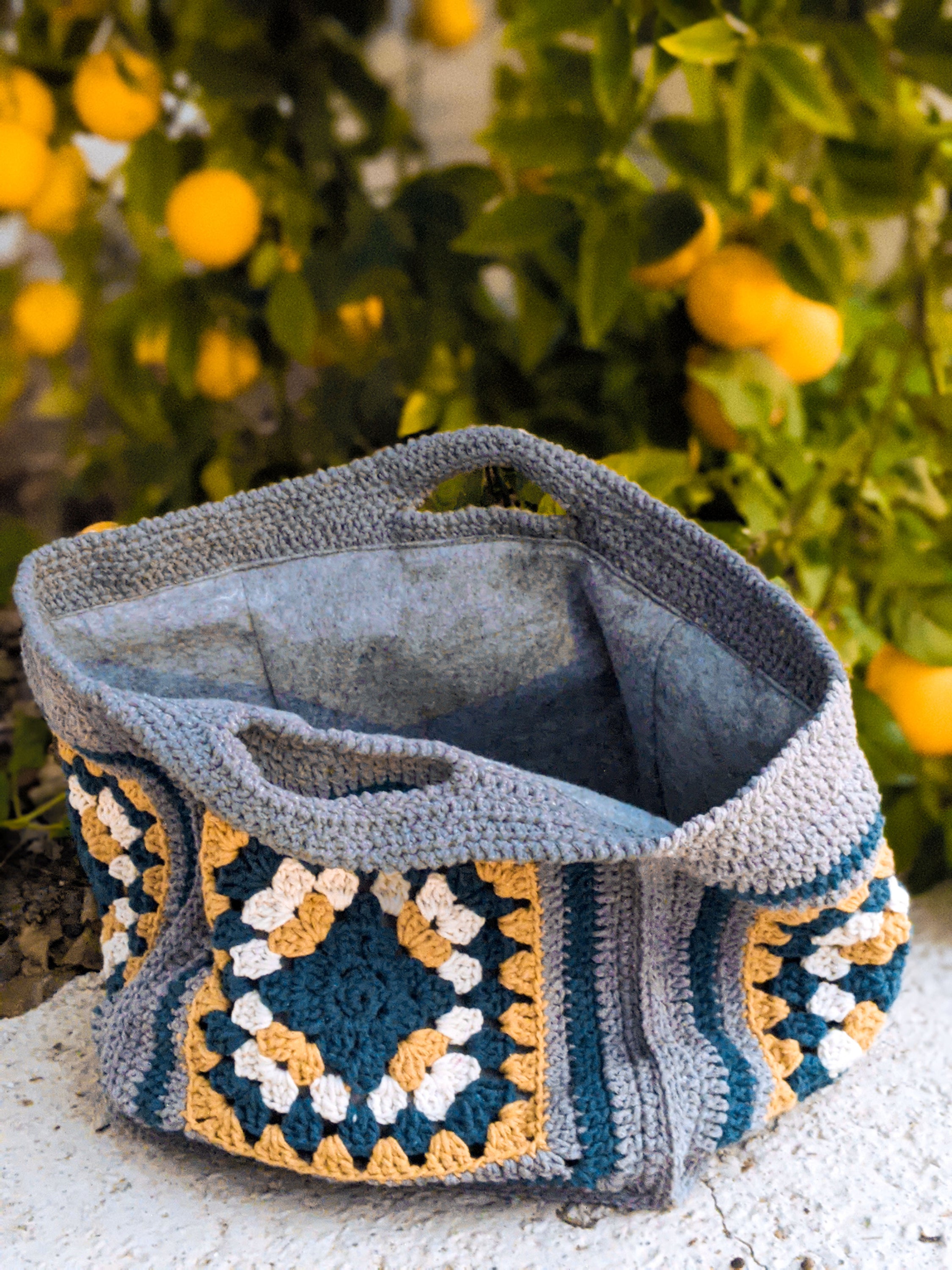 Handmade Bumblebee Jasper bag featuring grey, dark blue, mustard, and off-white colors, measuring 45 cm x 17 cm.