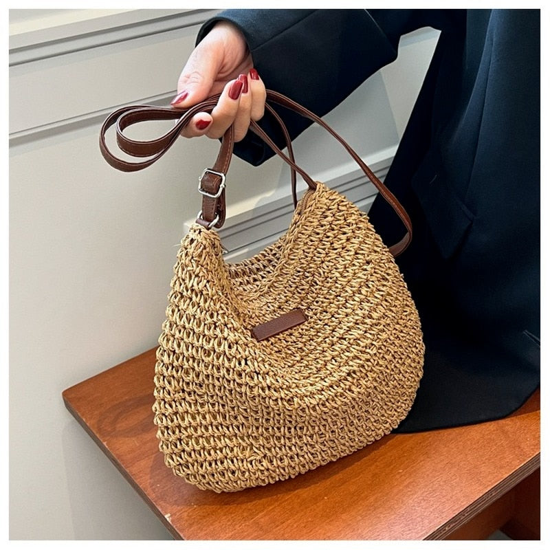 Casual Summer Shoulder Straw Bag made of woven straw with a chic shoulder strap, perfect for beach days.