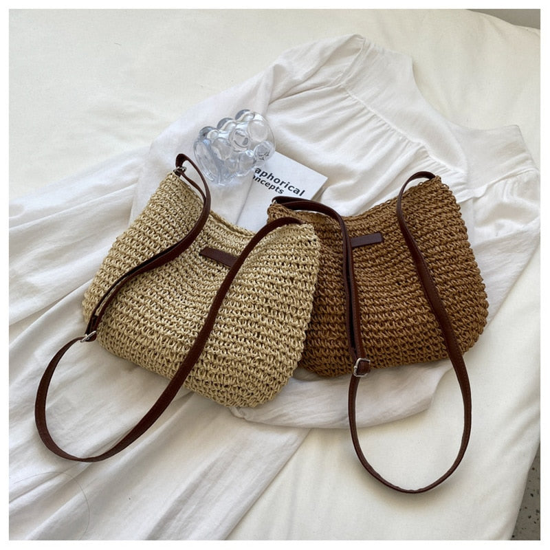 Casual Summer Shoulder Straw Bag made of woven straw with a chic shoulder strap, perfect for beach days.