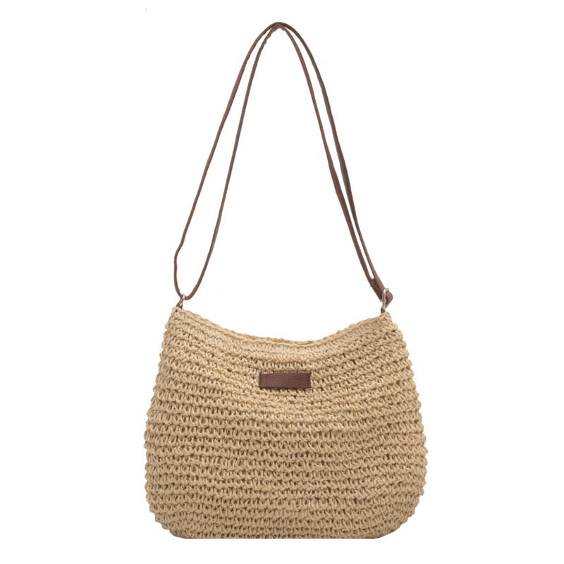 Casual Summer Shoulder Straw Bag made of woven straw with a chic shoulder strap, perfect for beach days.