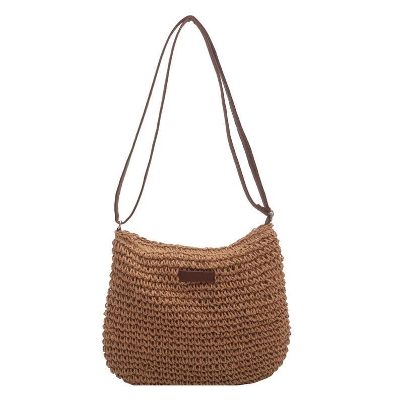 Casual Summer Shoulder Straw Bag made of woven straw with a chic shoulder strap, perfect for beach days.