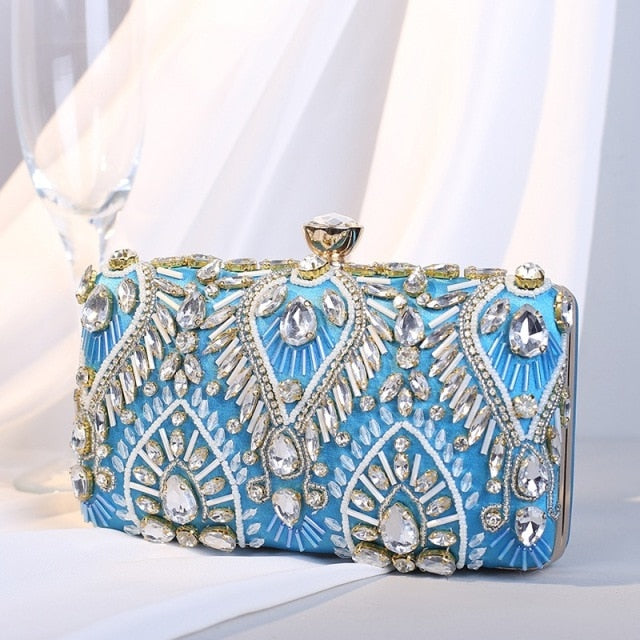 Luxury Diamond Rhinestone Clutch Handbag featuring exquisite beaded design and elegant clasp closure, available in blue, black, and champagne colors.