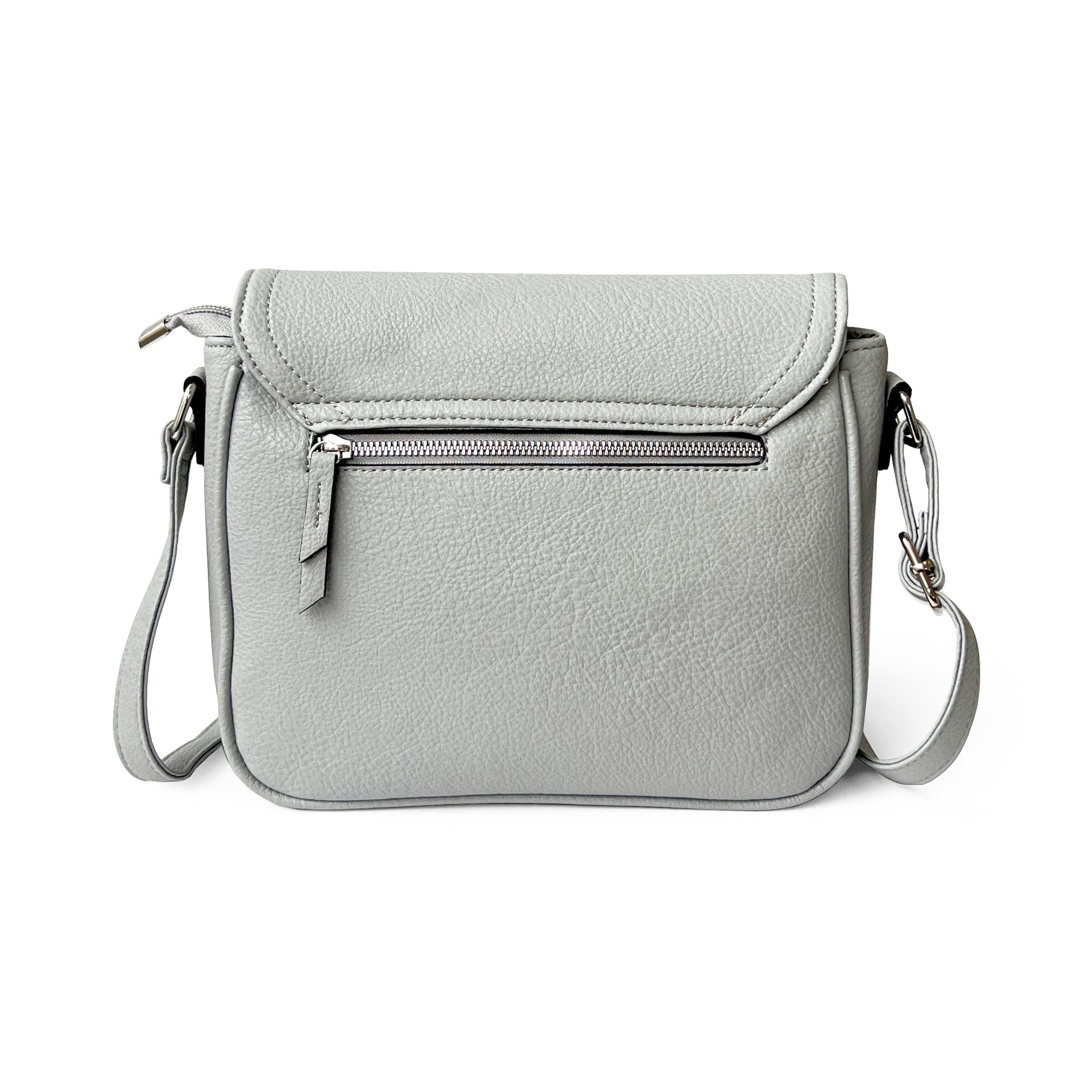 Stylish crossbody bag with rounded front flap, made from pebble PU, featuring adjustable strap and multiple pockets.