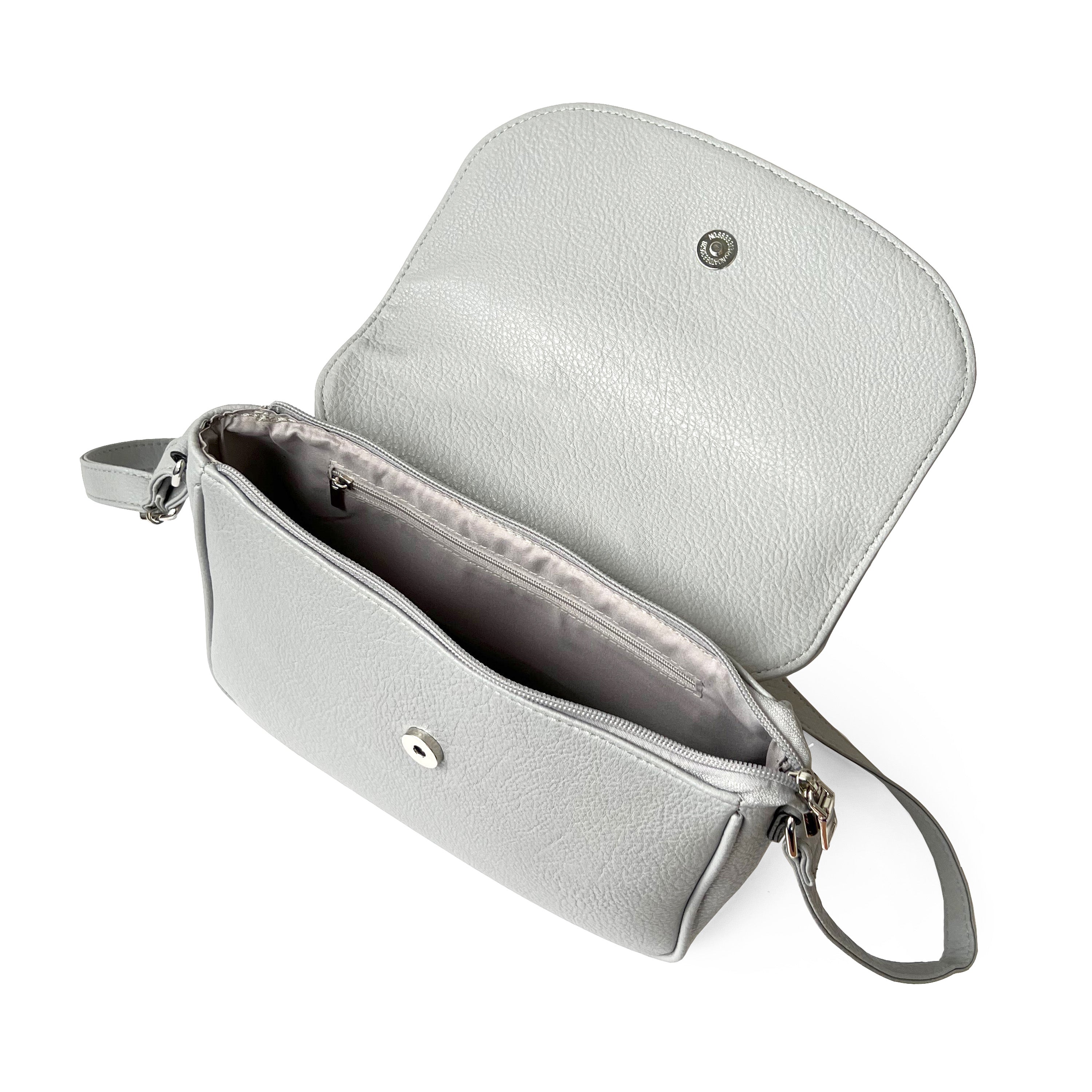 Stylish crossbody bag with rounded front flap, made from pebble PU, featuring adjustable strap and multiple pockets.