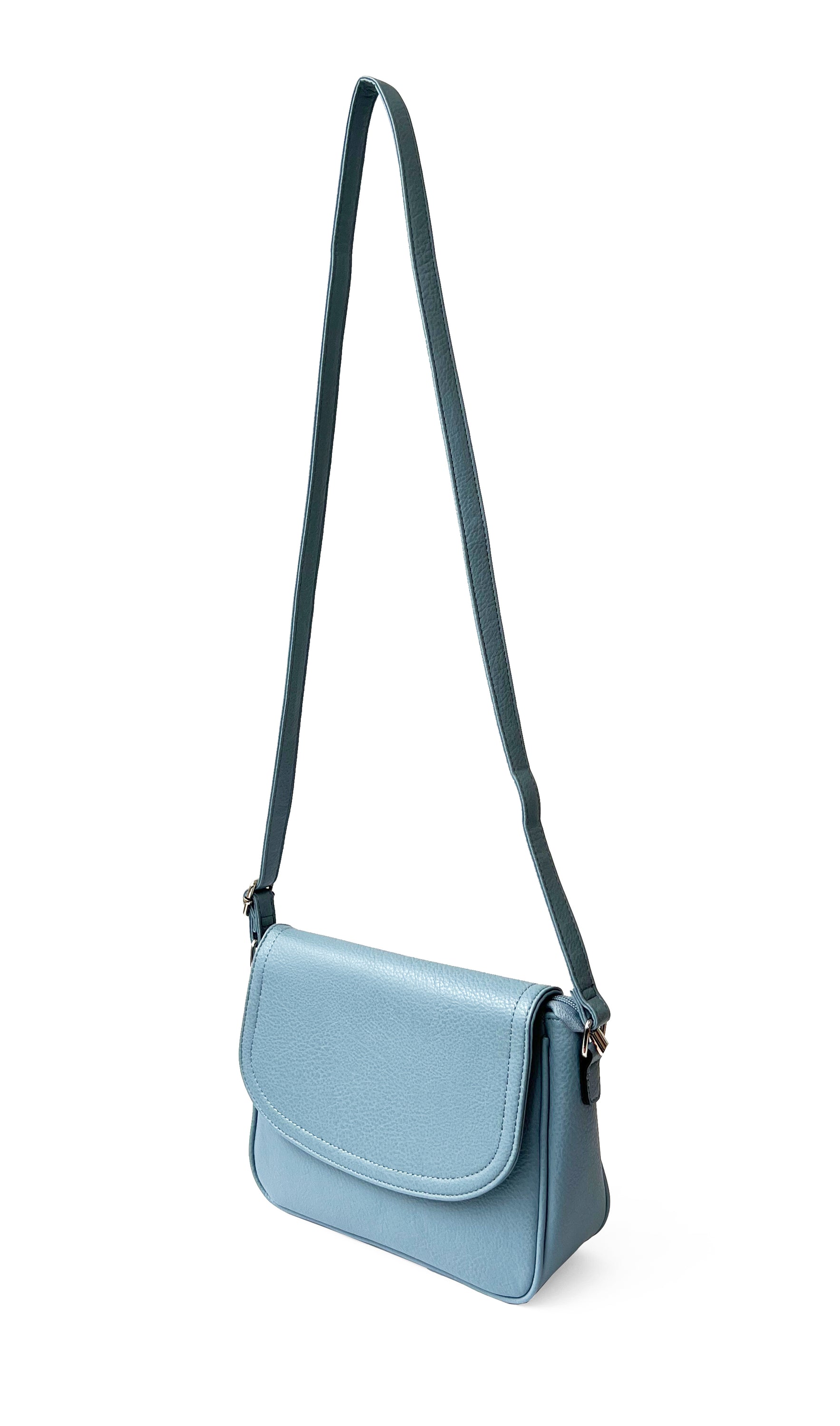 Stylish crossbody bag with rounded front flap, made from pebble PU, featuring adjustable strap and multiple pockets.