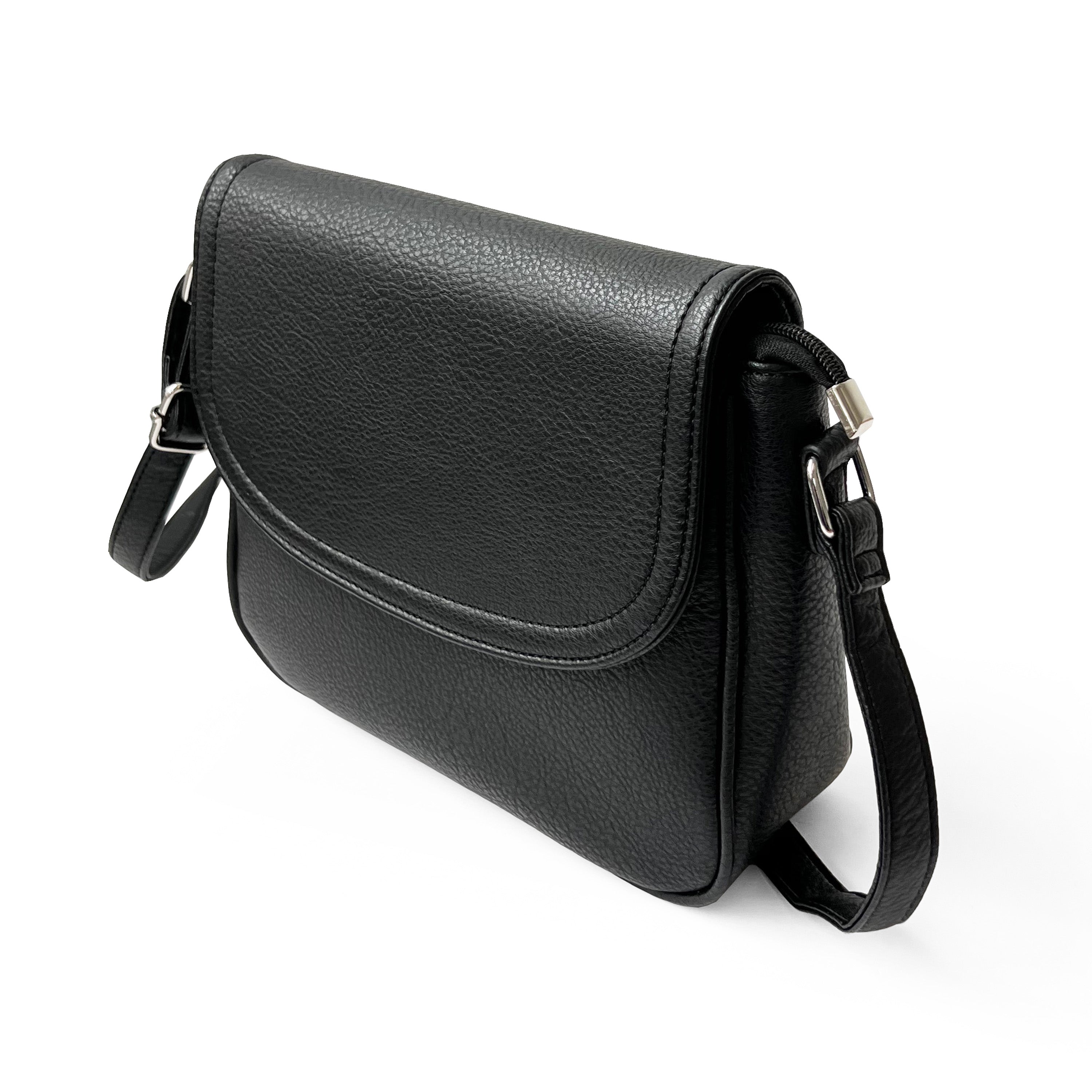 Stylish crossbody bag with rounded front flap, made from pebble PU, featuring adjustable strap and multiple pockets.