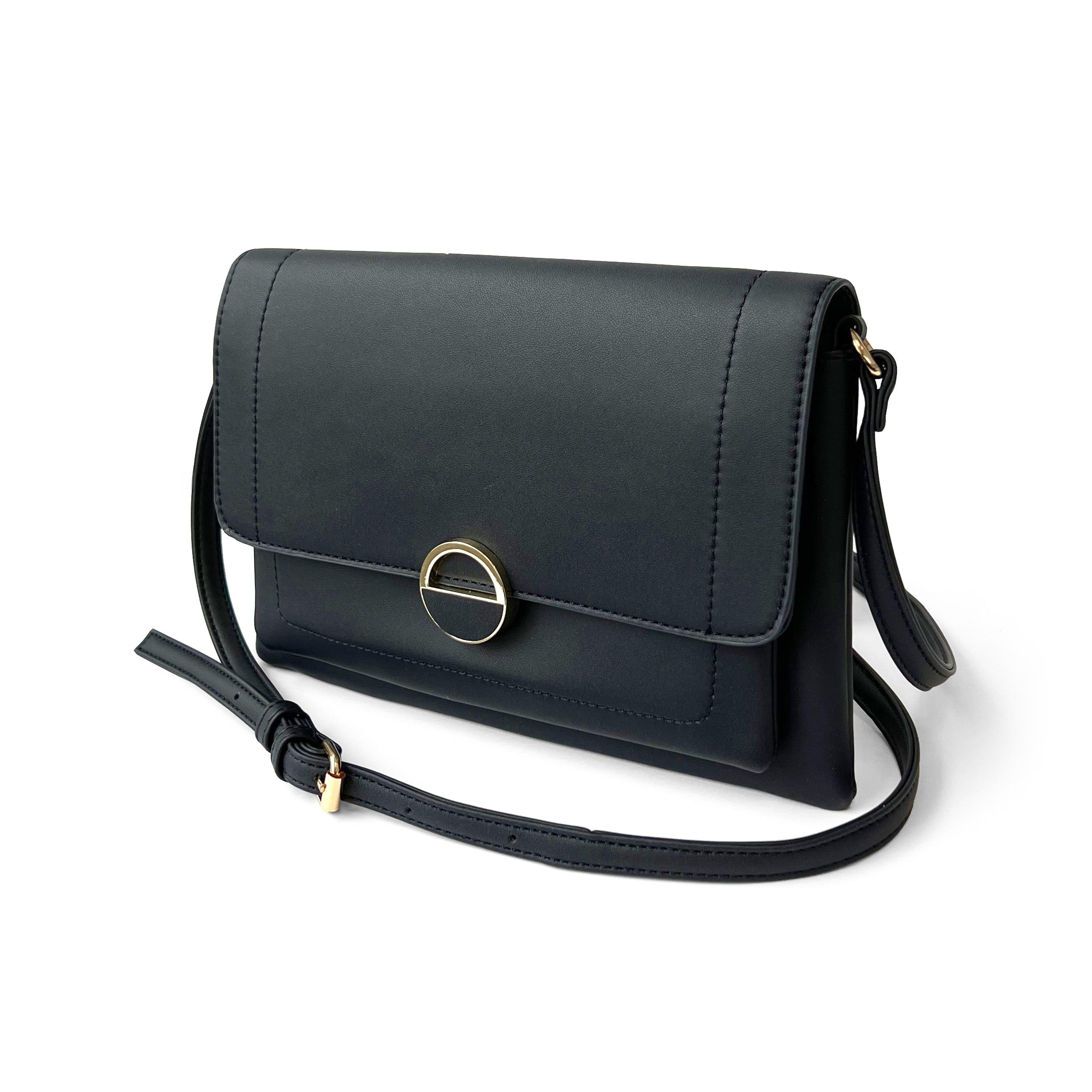 Stylish crossbody bag with a round ornament design, perfect for everyday use.