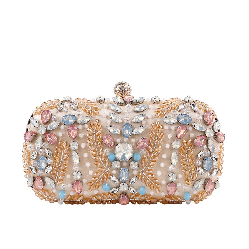 A luxurious champagne-colored crystal clutch bag adorned with rhinestones, perfect for weddings and formal events, featuring a floral pattern and a cell phone pocket.