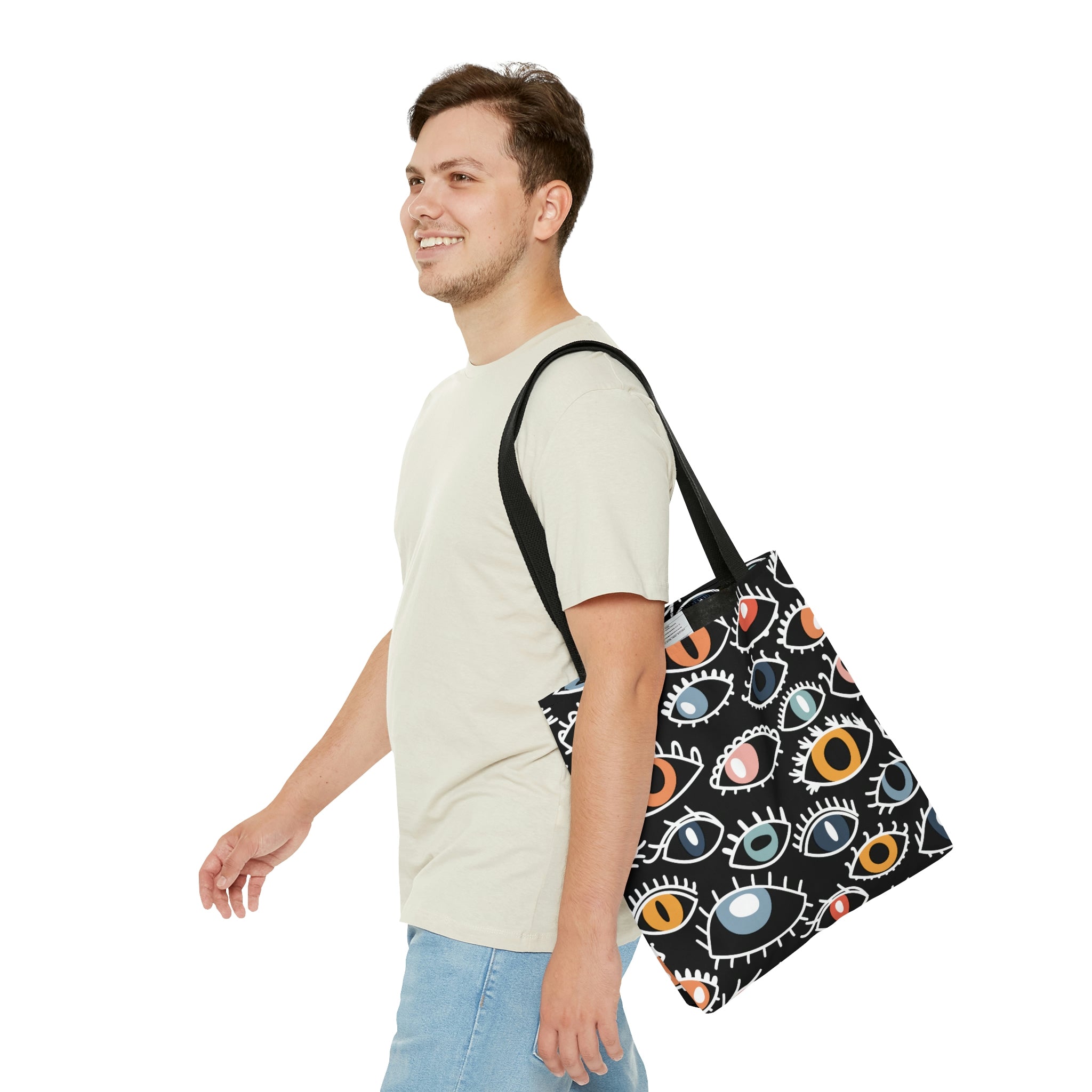 Egyptian Eye Beach Shopper Tote Bag featuring a stylish design, black cotton handles, and spacious interior, perfect for beach outings.