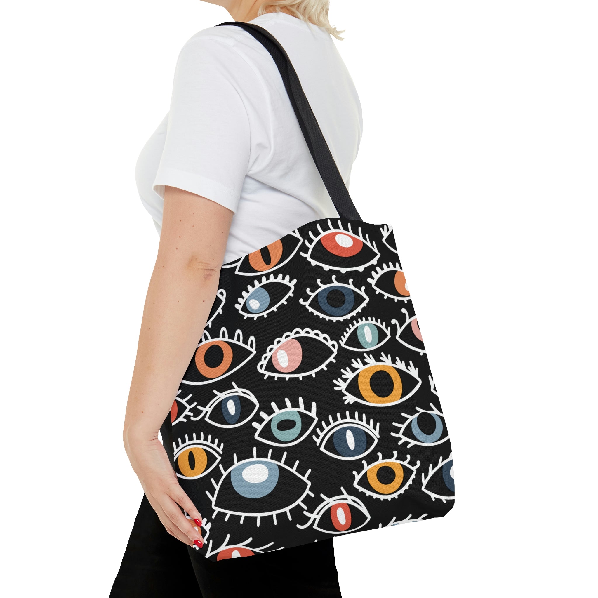 Egyptian Eye Beach Shopper Tote Bag featuring a stylish design, black cotton handles, and spacious interior, perfect for beach outings.