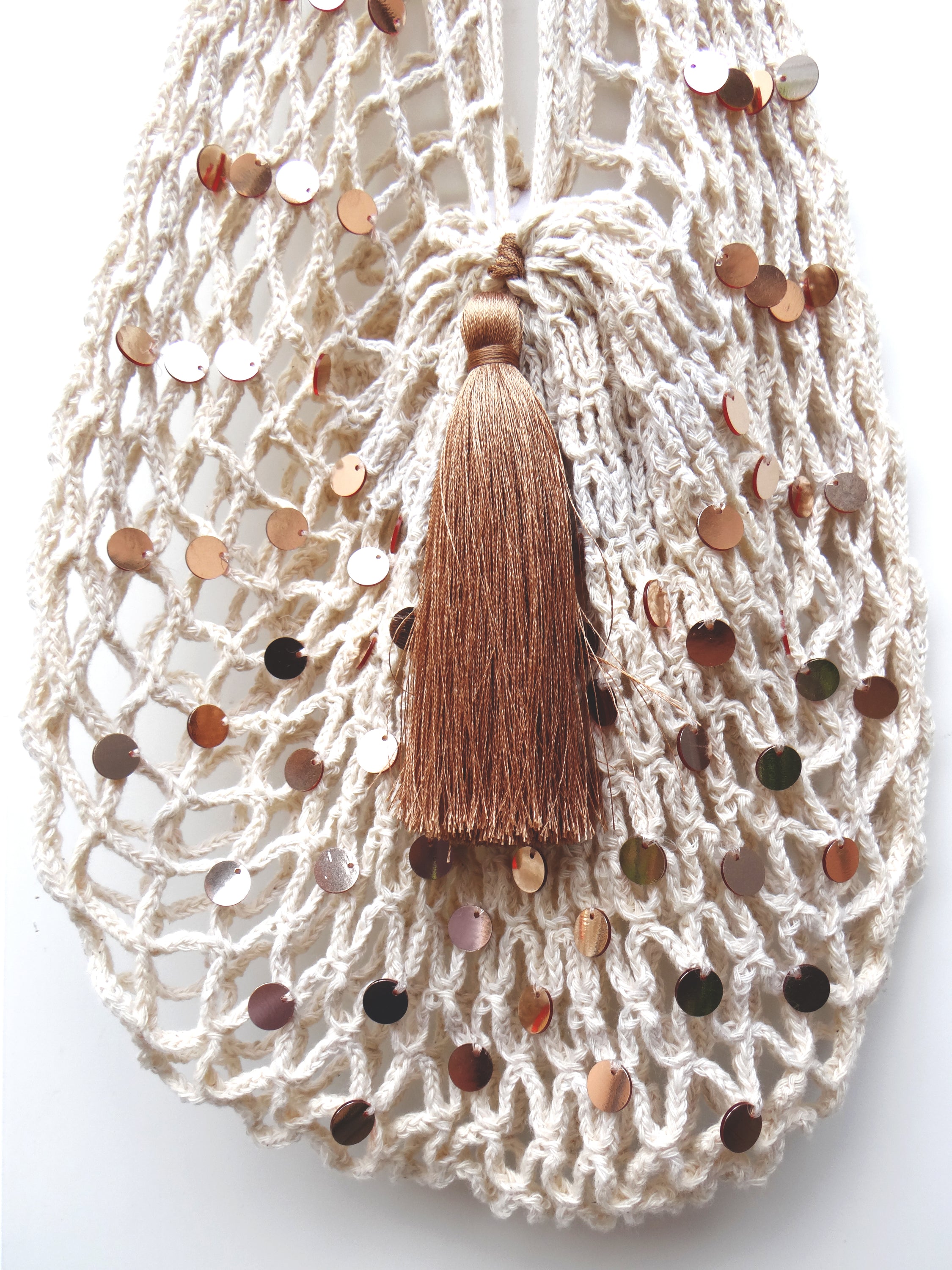 EUDORA handmade cotton net bag in natural cream color with a long handle, featuring a brown-bronze tassel and sequins.