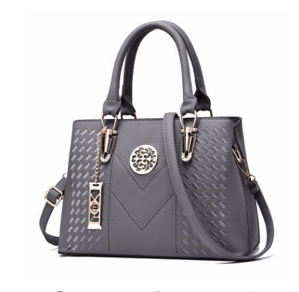 A stylish European American style women's shoulder bag made of durable PU material, featuring a soft handle, zipper closure, and lace detailing.