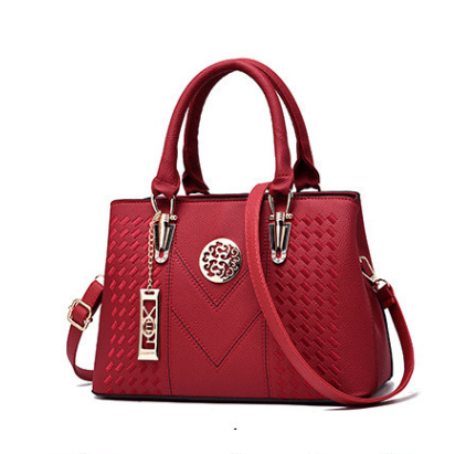 A stylish European American style women's shoulder bag made of durable PU material, featuring a soft handle, zipper closure, and lace detailing.