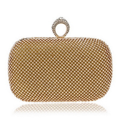 Elegant diamond-studded evening clutch bag with a chain shoulder strap, perfect for weddings and formal events.