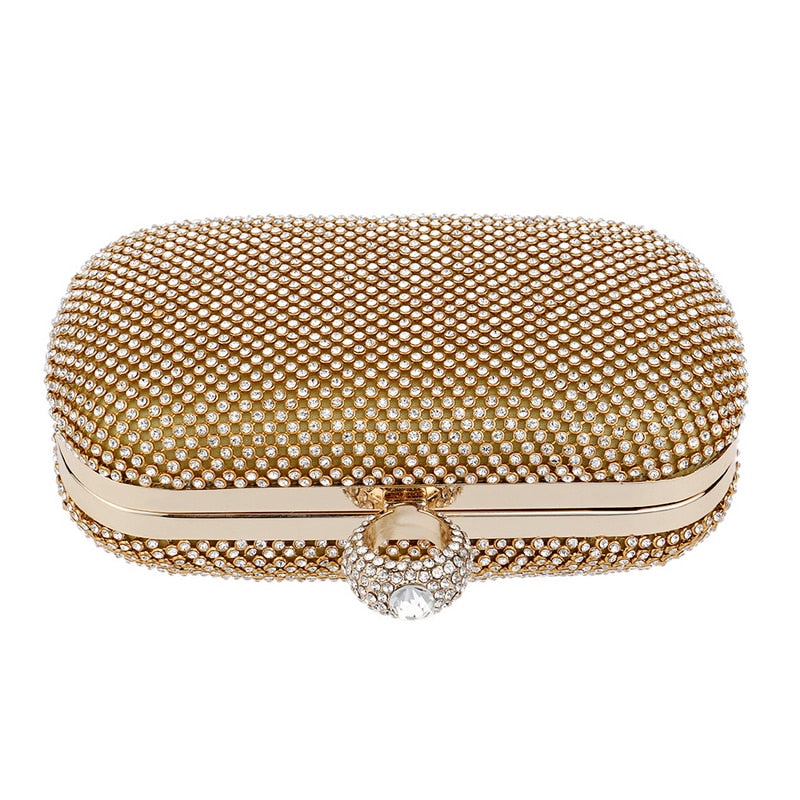 Elegant diamond-studded evening clutch bag with a chain shoulder strap, perfect for weddings and formal events.