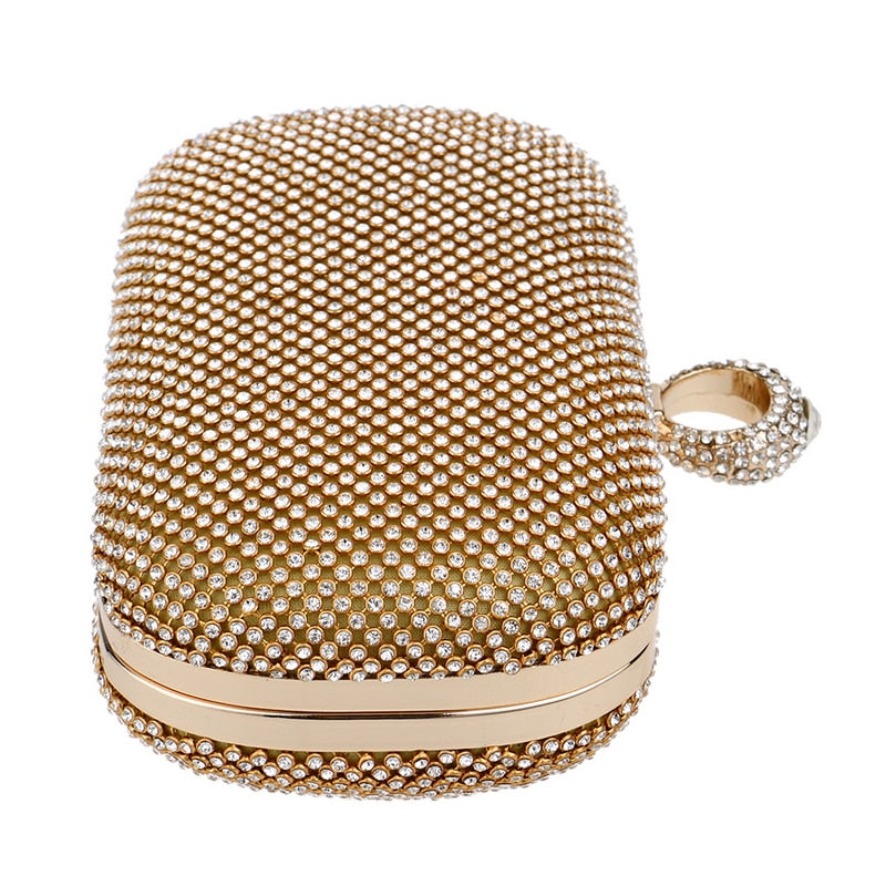 Elegant diamond-studded evening clutch bag with a chain shoulder strap, perfect for weddings and formal events.