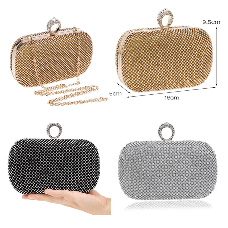 Elegant diamond-studded evening clutch bag with a chain shoulder strap, perfect for weddings and formal events.