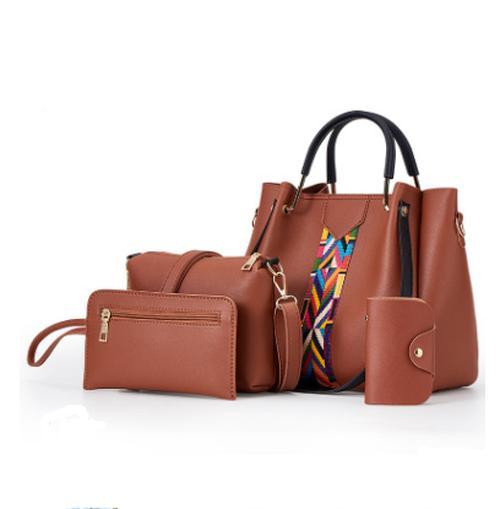 A stylish collection of four women's handbags in various colors and designs, showcasing their soft texture and practical features.