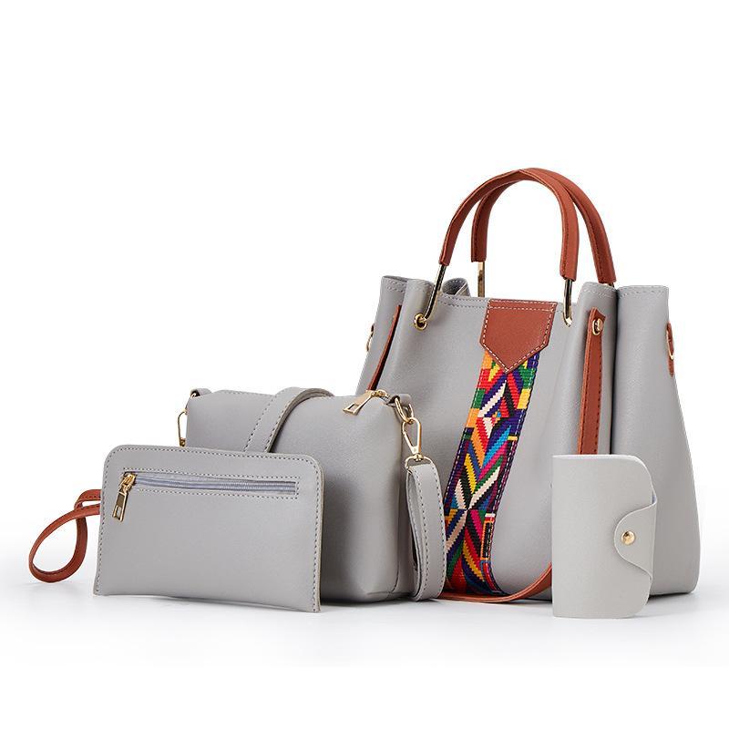 A stylish four-piece PU handbag set for women, featuring various sizes and compartments for organization.