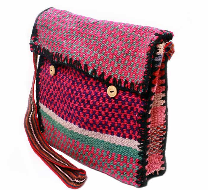 Fuchsia Messenger style Crossbody Bag featuring vibrant colors and intricate weaving by Quechua artisans.