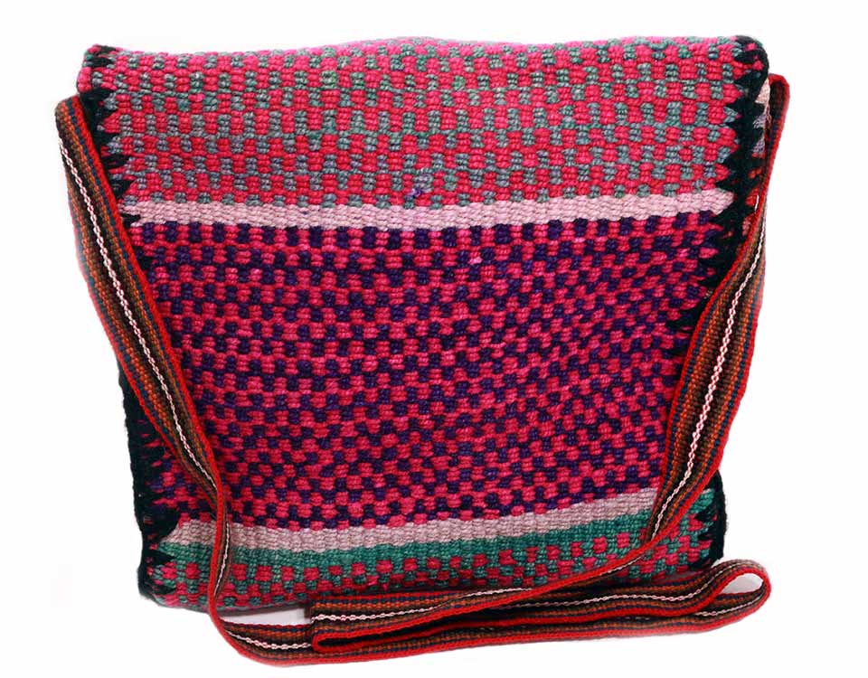 Fuchsia Messenger style Crossbody Bag featuring vibrant colors and intricate weaving by Quechua artisans.