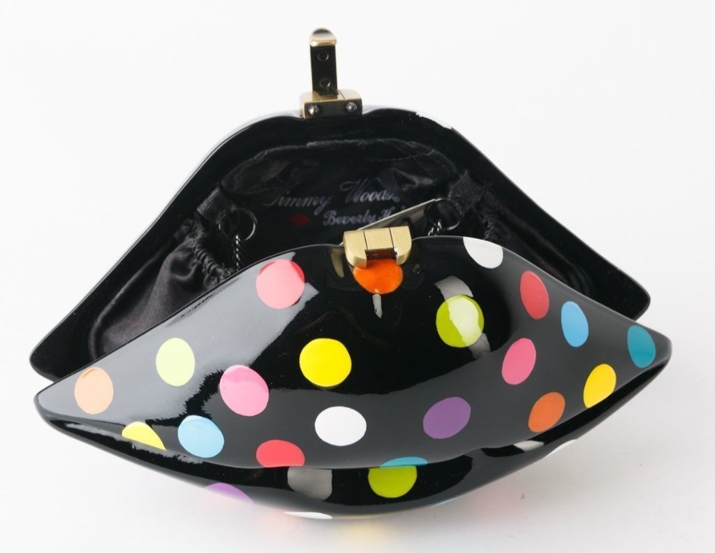 Gaga Mini Lips handbag featuring vibrant multi-color fashion dots and red lips detail, with a black comfy cord for easy carrying.