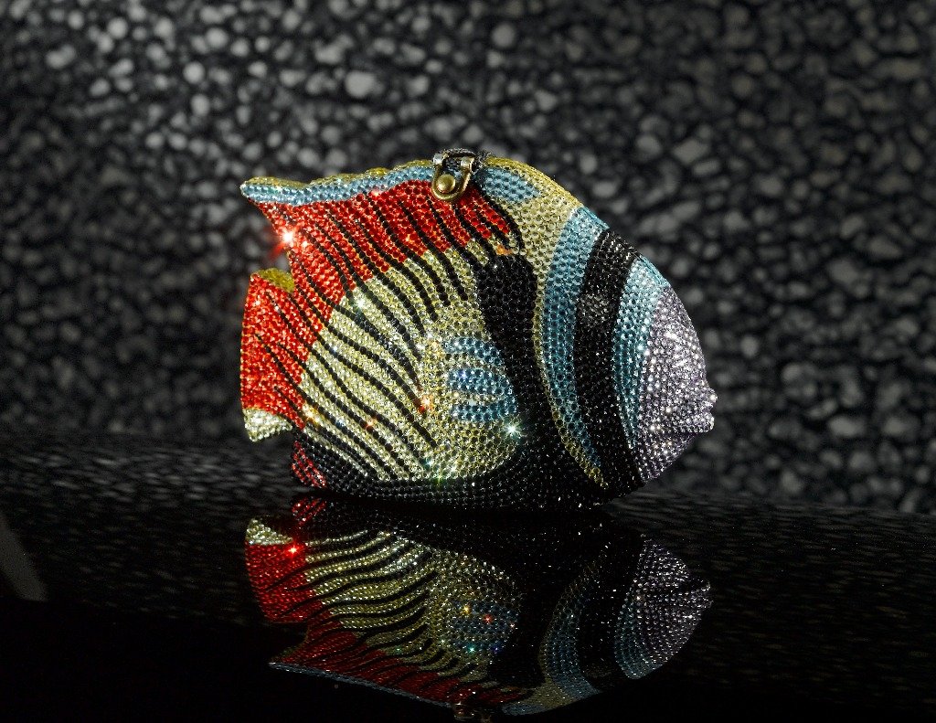 Hana Fish handbag featuring a tropical fish design, carved acacia wood, hand-painted details, and Swarovski crystal accents.