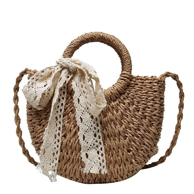 Handmade Half-Round Rattan Woven Straw Bag showcasing its unique half-moon shape and natural straw material, perfect for bohemian style.