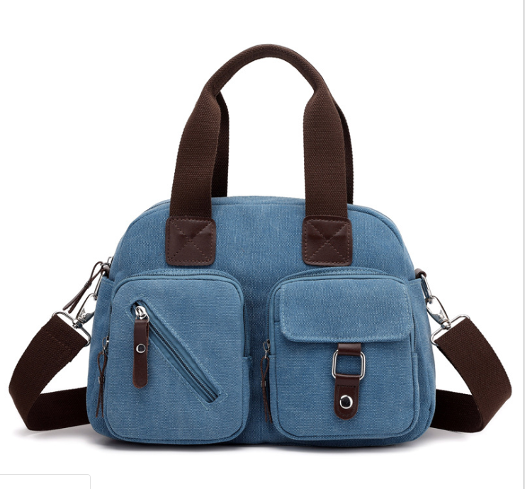 High Quality Canvas Messenger Bag for Ladies in plain design, featuring a soft handle and zipper closure, perfect for casual outings.